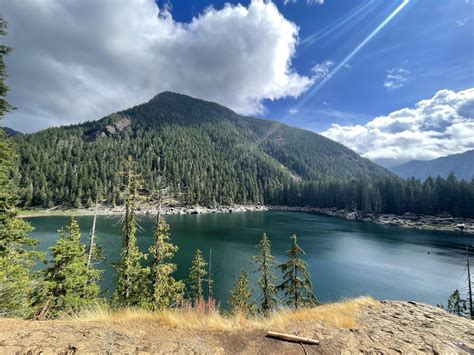 Lena Lake fingers her hairy pussy .